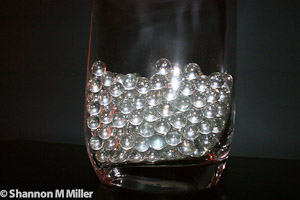 Glass Marbles in Glass Vase